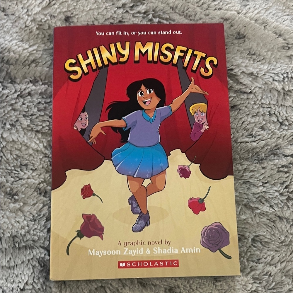 5/$10 item Scholastic Shiny Misfits Graphic Novel - Red and Blue Cover